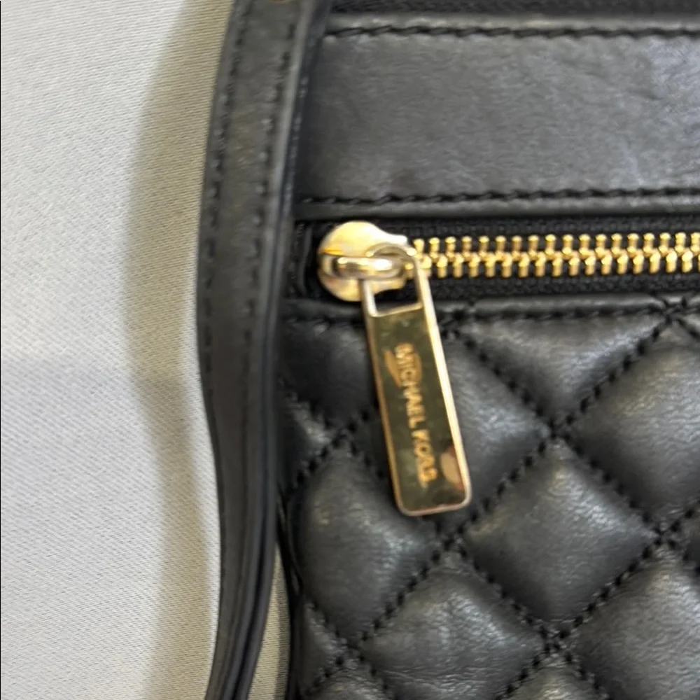 Michael Kors Black and Gold Quilted Leather Clutch